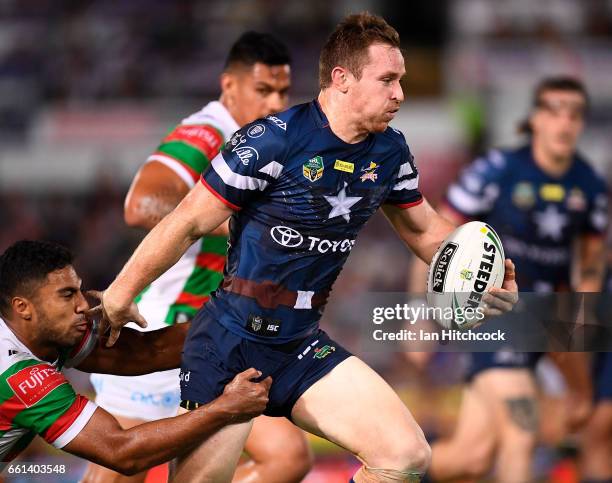 Michael Morgan of the Cowboys makes a break during the round five NRL match between the North Queensland Cowboys and the South Sydney Rabbitohs at...