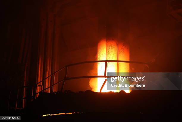 Three graphite electrodes glow red hot in an electric arc furnace at the electric steel-making shop at the Volzhsky Pipe Plant OJSC, operated by TMK...