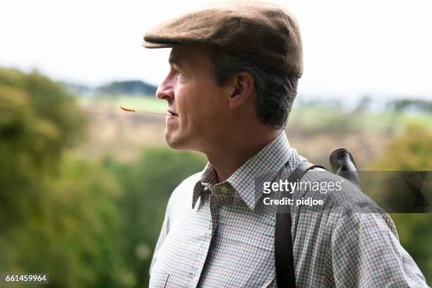 portrait of a english man outdoors - golf driver stock pictures, royalty-free photos & images