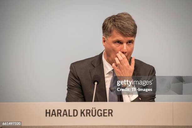 Chief Executive Officer Harald Krueger of German car manufacturer BMW gestures during his speech at the annual accounts press conference at the BWM...