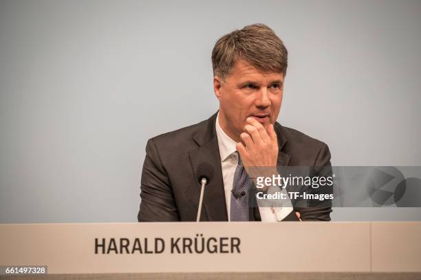 Chief Executive Officer Harald Krueger of German car manufacturer BMW gestures during his speech at the annual accounts press conference at the BWM...