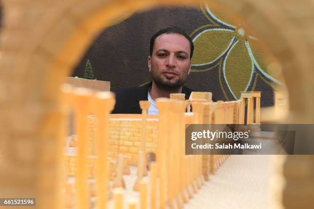 Syrian refugee artist Ahmad Hariri is seen on set at the Zaatari refugee camp during the shooting of a new documentary series by German TV channel...