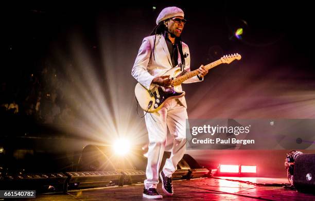 American guitarist, composer, producer and singer-songwriter Nile Rogers performs on stage in his Let's Dance show at Ziggo Dome, Amsterdam,...