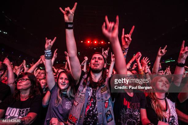 Rock fans in the front row of the audience watching Danish rock band Volbeat at Ziggo Dome, Amsterdam, Netherlands, 15 November 2016.