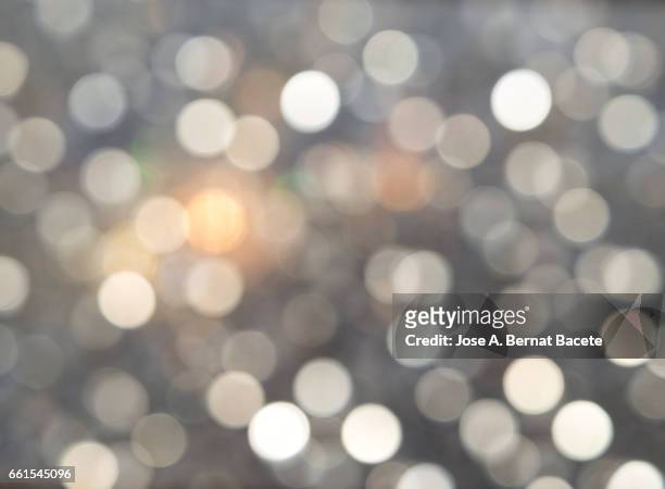 close-up of defocused light in the shape of circles - resplandeciente stock pictures, royalty-free photos & images