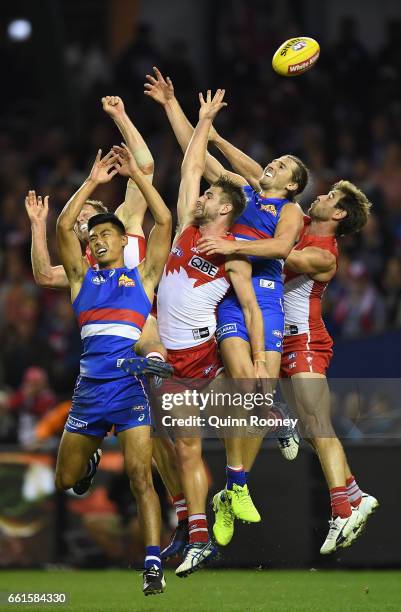 Marcus Bontempelli of the Bulldogs flies for a mark during the round two AFL match between the Western Bulldogs and the Sydney Swans at Etihad...