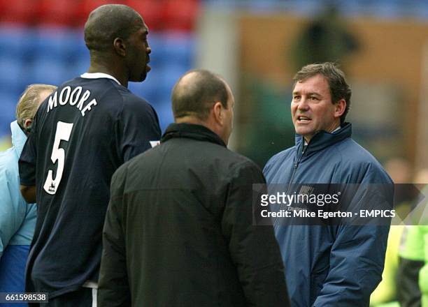 West Bromwich Albion's Darren Moore walks past his manager Bryan Robson as he leaves the pitch after being sent off