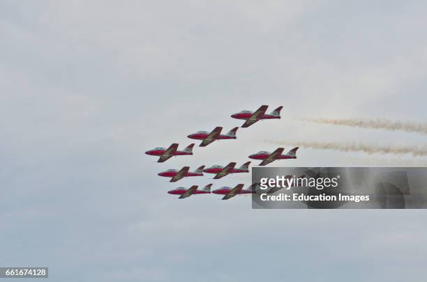 Wisconsin, Oshkosh, AirVenture 2016, Canadian Air Force Snowbirds Aerobatic Team Aircraft flying Canadair CT-114 Tudor Jets formation Pattern.