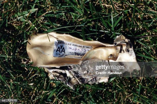 In this handout provided by the Federal Bureau of Investigation , debris from American Airlines Flight 77 is collected on scene following an attack...