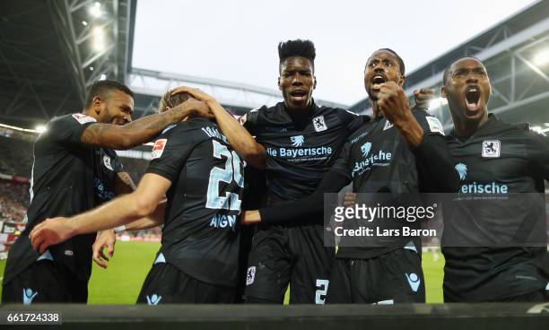 Stefan Aigner of 1860 Muenchen celebrates his team's first goal with team mates during the Second Bundesliga match between Fortuna Duesseldorf and...