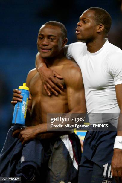 West Ham United's Nigel Reo-Coker celebrates at the final whistle with Marlon Harewood