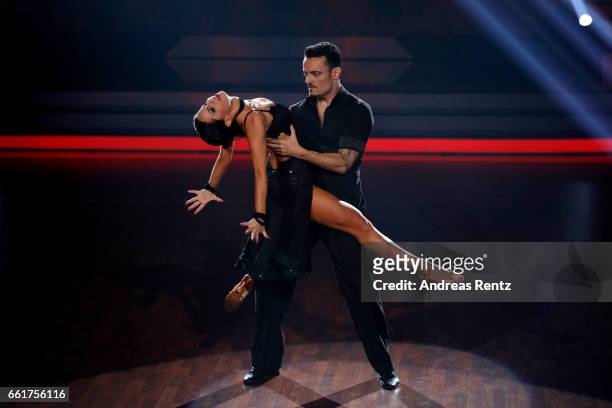 Giovanni Zarrella and Christina Luft perform on stage during the 3rd show of the tenth season of the television competition 'Let's Dance' on March...