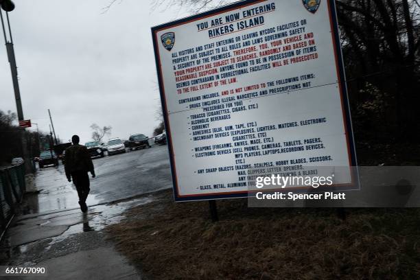 Man enters the road to Rikers Island on March 31, 2017 in New York City. New York Mayor Bill de Blasio has said that he agrees with the fundamentals...