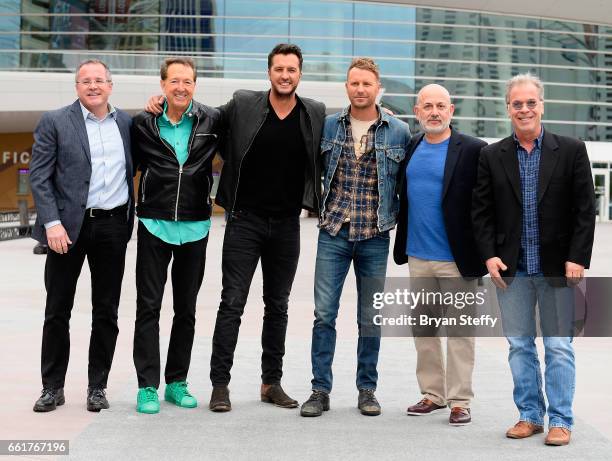 Academy of Country Music CEO Pete Fisher, Dick Clark EVP of Television Barry Adelman, hosts Luke Bryan and Dierks Bentley, EVP of Specials, Music and...