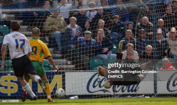 Preston North End's Marcus Stewart scores the 2nd goal past the despairing dive of Norwich City's keeper Robert Green