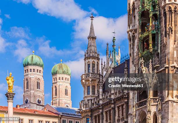 germany, munich, view of marian column, spires of cathedral of our lady and new city hall - munich stockfoto's en -beelden