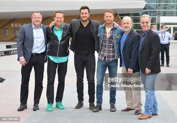 Of the Academy of Country Music Pete Fisher, executive producer Barry Adelman, host/singer/songwriter Luke Bryan, host/singer/songwriter Dierks...