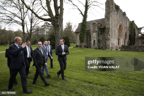 French President Francois Hollande and Junior Minister for European Affairs Harlem Desir visit the Vaux de Cernay abbey during the third seminar of...