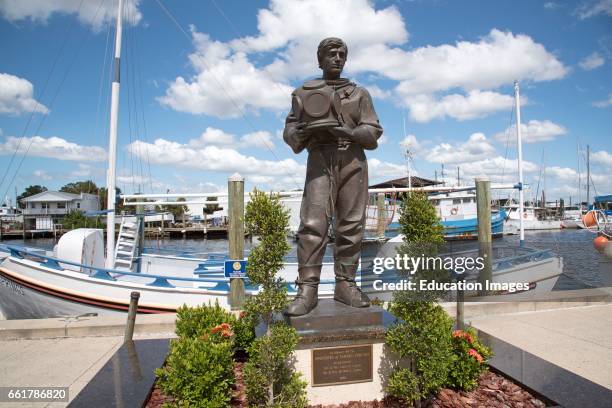 Tarpon Springs Florida USA, A sculpture in memory of the 'spongers' on the waterfront at Tarpon Springs.