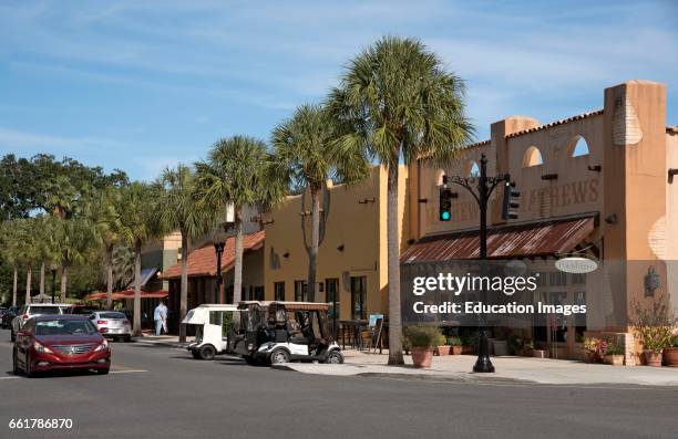 Spanish Springs town center Florida USA, Town center shops along a palm lined street.