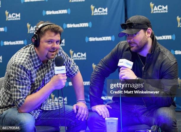 SiriusXM host Storme Warren speaks with singer-songwriter Chris Young during SiriusXM's The Highway Channel broadcasts backstage leading up to the...