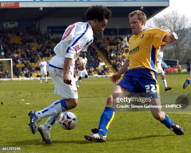 Carlisle United's Karl Hawley and Mansfield Town's Jon Olav Hjelde in action