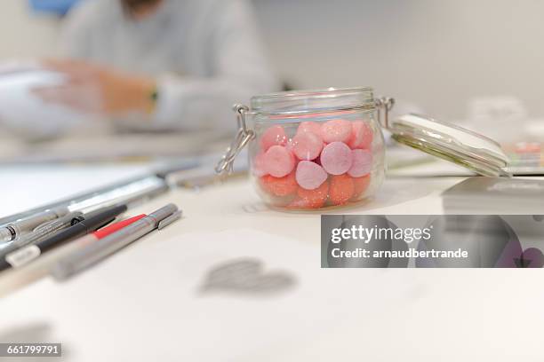 jar of fraise tagada sweets on a desk - fraise bildbanksfoton och bilder