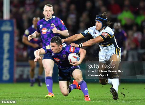 Wigan Warriors' Liam Forsyth is tackled during the Betfred Super League Round 7 match between Leeds Rhinos and Wigan Warriors at Headingley Carnegie...