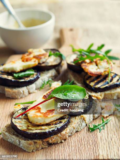 vegetarian grilled aubergine open sandwich - grilled halloumi stock pictures, royalty-free photos & images