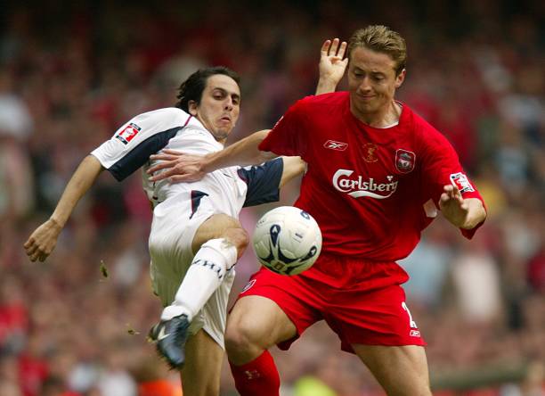 Liverpool's Jan Kromkamp and West Ham United's Yossi Benayoun