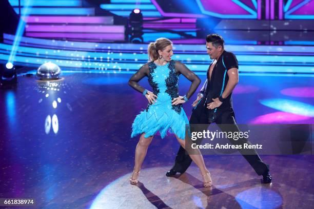 Anni Friesinger-Postma and Erich Klann perform on stage during the 3rd show of the tenth season of the television competition 'Let's Dance' on March...