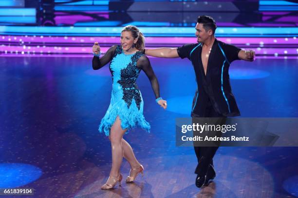 Anni Friesinger-Postma and Erich Klann perform on stage during the 3rd show of the tenth season of the television competition 'Let's Dance' on March...