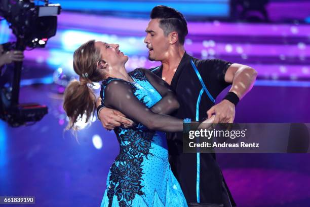 Anni Friesinger-Postma and Erich Klann perform on stage during the 3rd show of the tenth season of the television competition 'Let's Dance' on March...