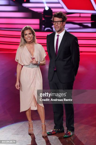 Hosts Sylvie Meis and Daniel Hartwig are seen on stage during the 3rd show of the tenth season of the television competition 'Let's Dance' on March...