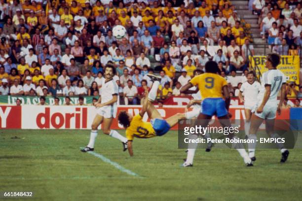 Brazil's Zico scores the first goal of the game with a bicycle-kick