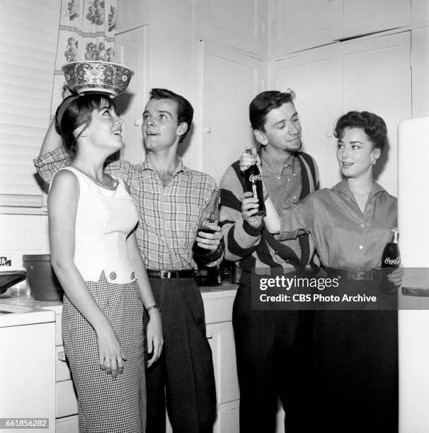 Young television actors on a double date. Marlene Willis and Richard Miles on a double date with Bob Denver and Gigi Perreau. Bob Denver is a cast...