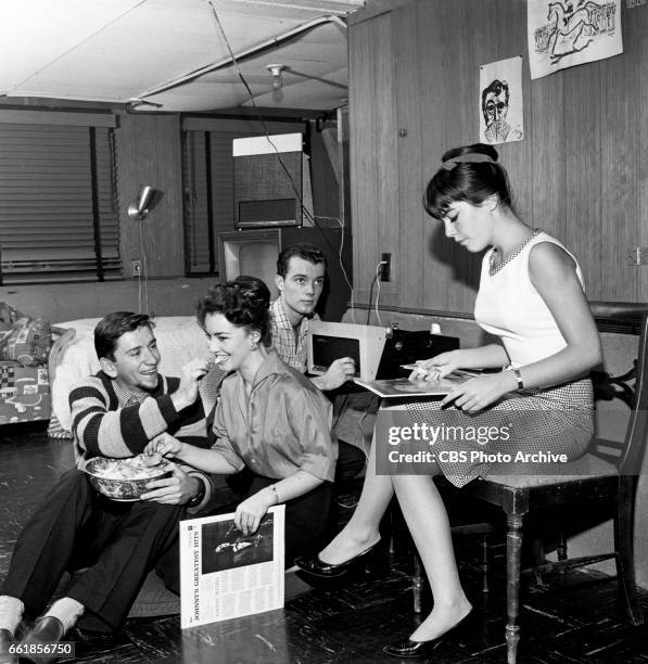 Young television actors on a double date. Bob Denver and Gigi Perreau on a double date with Richard Miles and Marlene Willis. Bob Denver is a cast...