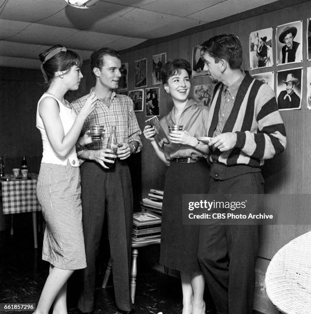 Young television actors on a double date. Marlene Willis and Richard Miles on a double date with Gigi Perreau and Bob Denver. Bob Denver is a cast...