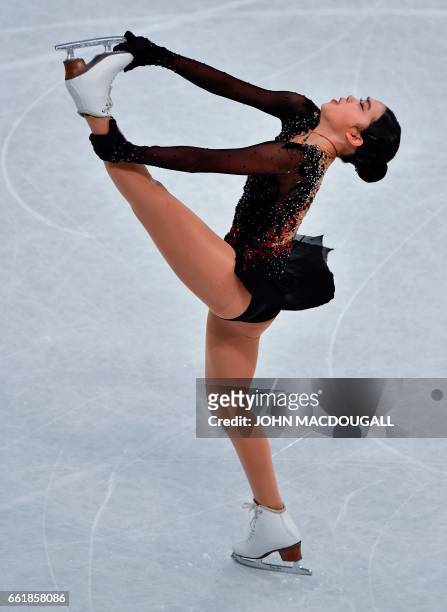 The US' Karen Chen competes in the women's free skating event at the ISU World Figure Skating Championships in Helsinki, Finland on March 31, 2017....