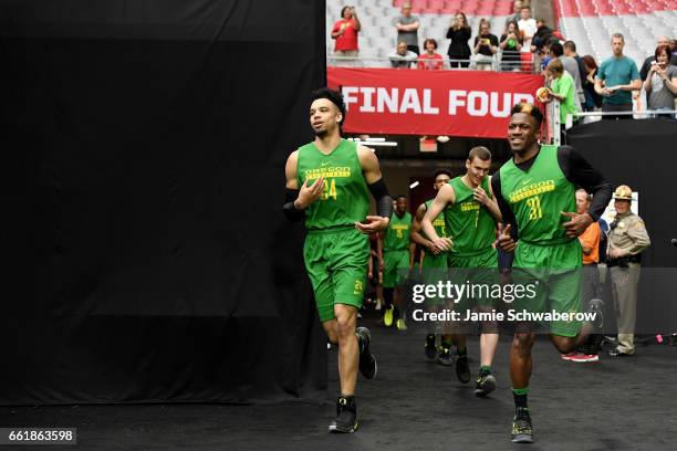 The Oregon Ducks basketball team emerge from the tunnel during practice ahead of the 2017 NCAA Photos via Getty Images Men's Final Four at University...