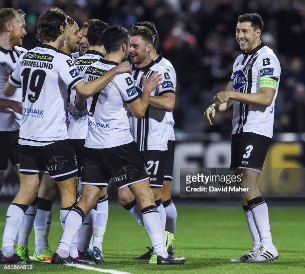 Dundalk , Ireland - 31 March 2017; Brian Gartland, right, of Dundalk celebrates after scoring his side's third goal with teammates during the SSE...