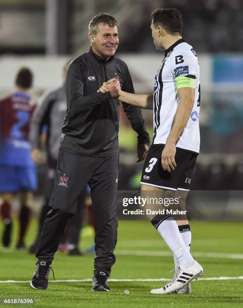 Dundalk , Ireland - 31 March 2017; Dundalk manager Stephen Kenny celebrates with Brian Gartland at the end of the SSE Airtricity League Premier...