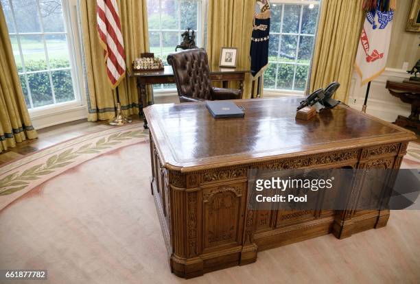 Executive Orders regarding trade lay on the Resolute desk in the Oval Office of the White House March 31, 2017 in Washington, DC. President Trump...