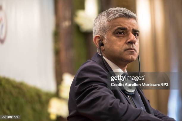 Mayor of London, Sadiq Khan delivers a speech next to the Mayor of Paris and Head of C40 , Anne Hidalgo and Mayor of Seoul, Park Won soon at the City...