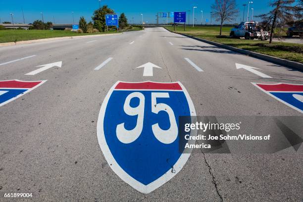 Interstate 95 road sign , departing Philadelphia International Airport, painted on the roadway.