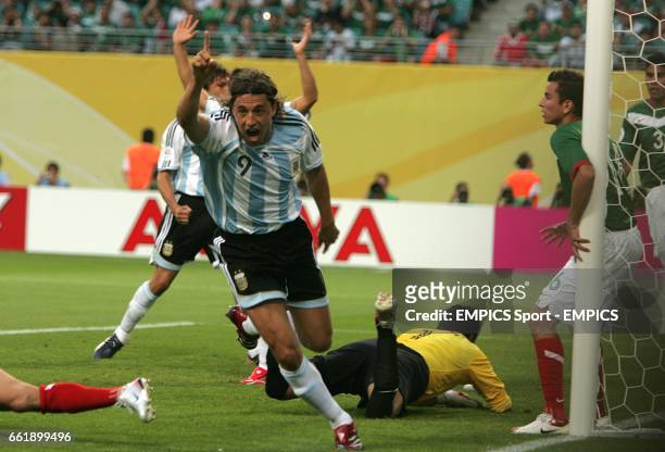 Hernan Crespo celebrates after forcing an own goal from Mexico's Jared Borgetti
