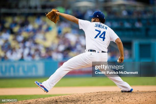 Kenley Jansen of the Los Angeles Dodgers throws a pitch to a Washington Nationals batter during the ninth inning in game three of the National League...