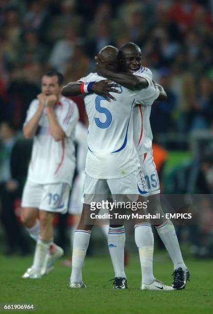 France's William Gallas and Lilian Thuram celebrate the win against Spain