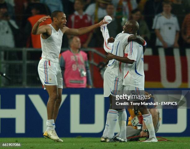 France's Thierry Henry and William Gallas celebrate the win against Spain