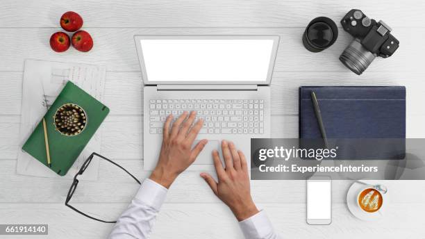 knolling hands typing on a laptop keyboard - on computer blank screen stock pictures, royalty-free photos & images